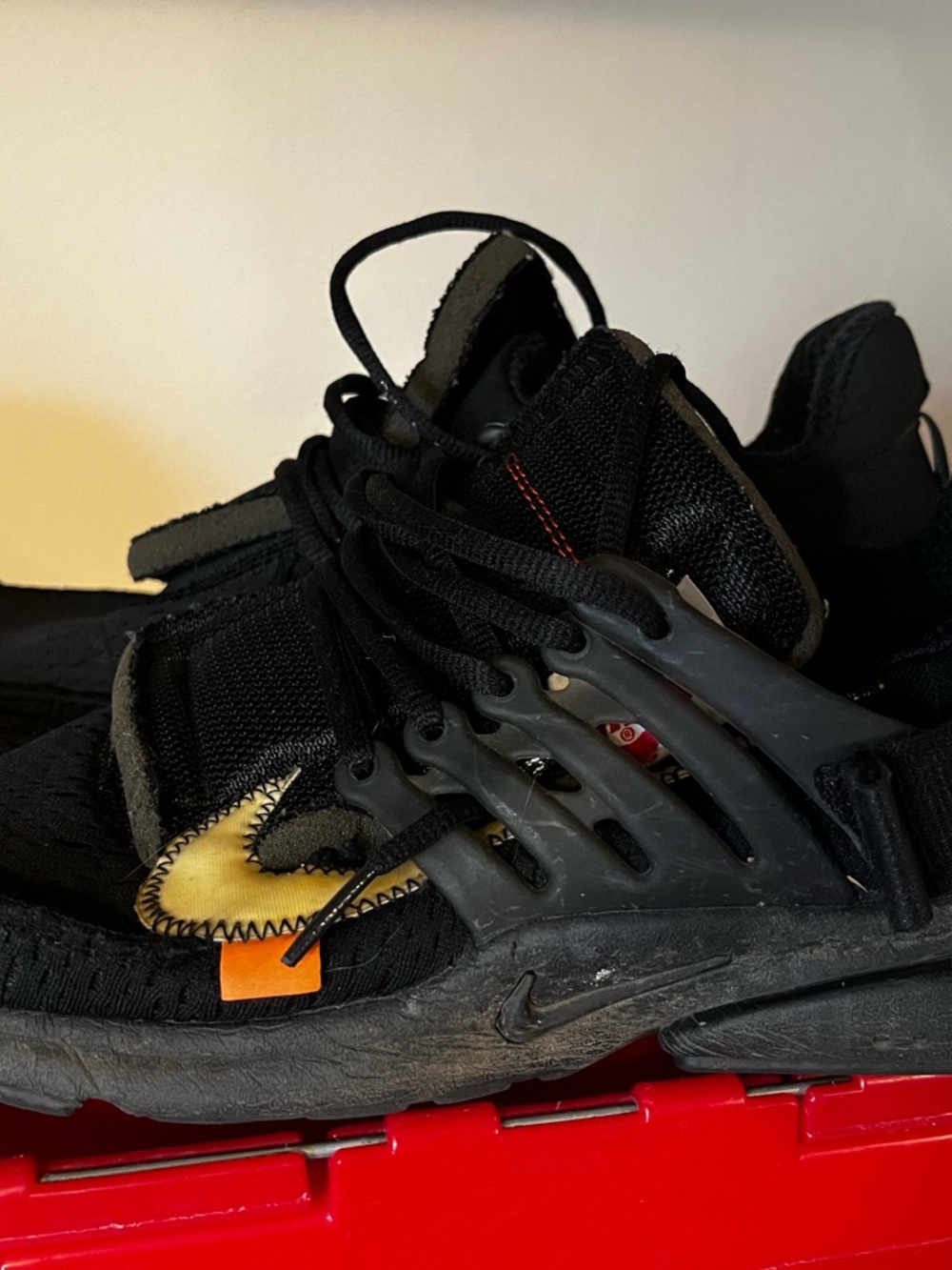 Nike Black Sneakers with Yellow Swoosh and Orange Tag